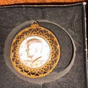 JFK Gold Coin pendant.